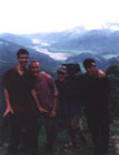 On top of a ridge while trekking in Nepal with friends Nat, Matt, and Kevin